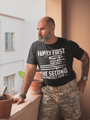 Soldier man in army gear wearing Black Short Sleeve Graphic Tee with printed quote : Family First The Second to Protect Them