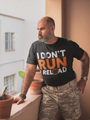 Soldier man in army gear wearing Black Short Sleeve Graphic Tee with printed quote : I don't run, I reload 