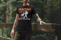 Man wearing Short Sleeve Graphic Tee with printed quote : Hunting, no mask needed for my groceries.